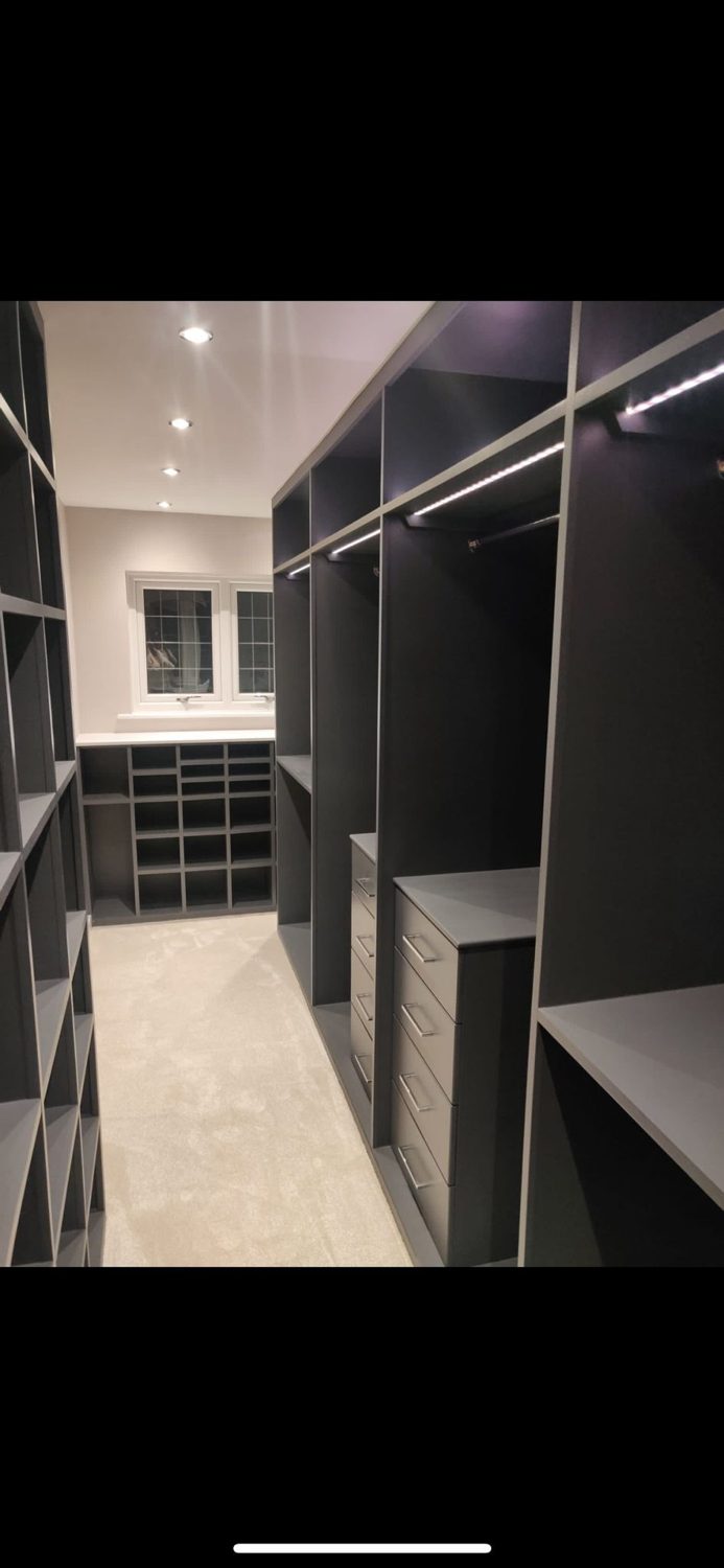 Dark walk-in wardrobe